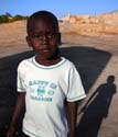 13 Sudanese boy in Happy in Paradise T-shirt, Suakin, Sudan